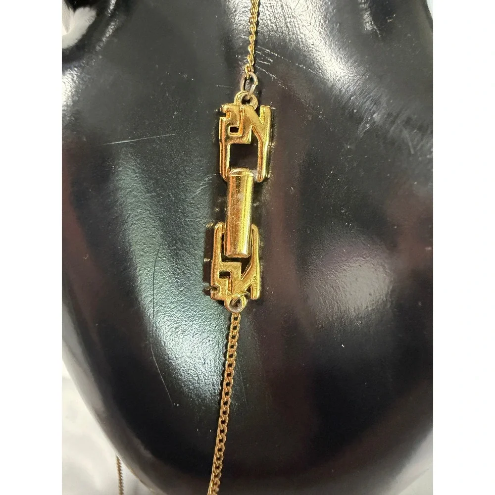 Nina Ricci Necklace Womens OS‎ Gold NR Logo Rhinestone Ribbon Pendant Vintage